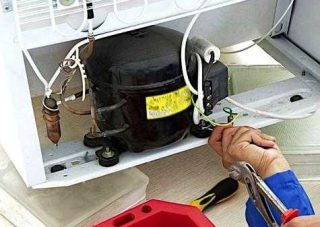 تعمیر یخچال فریزر در کرج (فوری یک روزه)-09121507825
